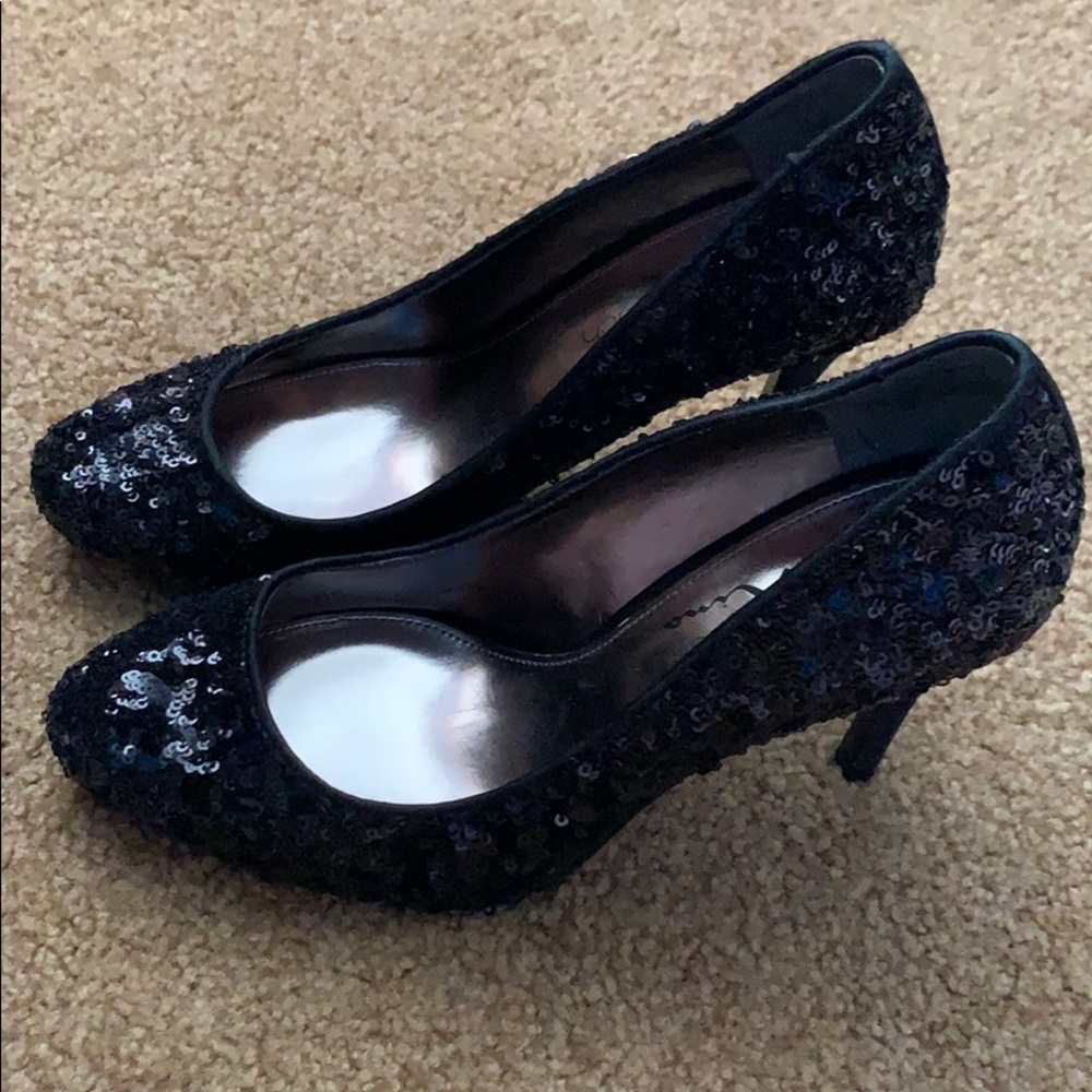 Black sparkly heels.
